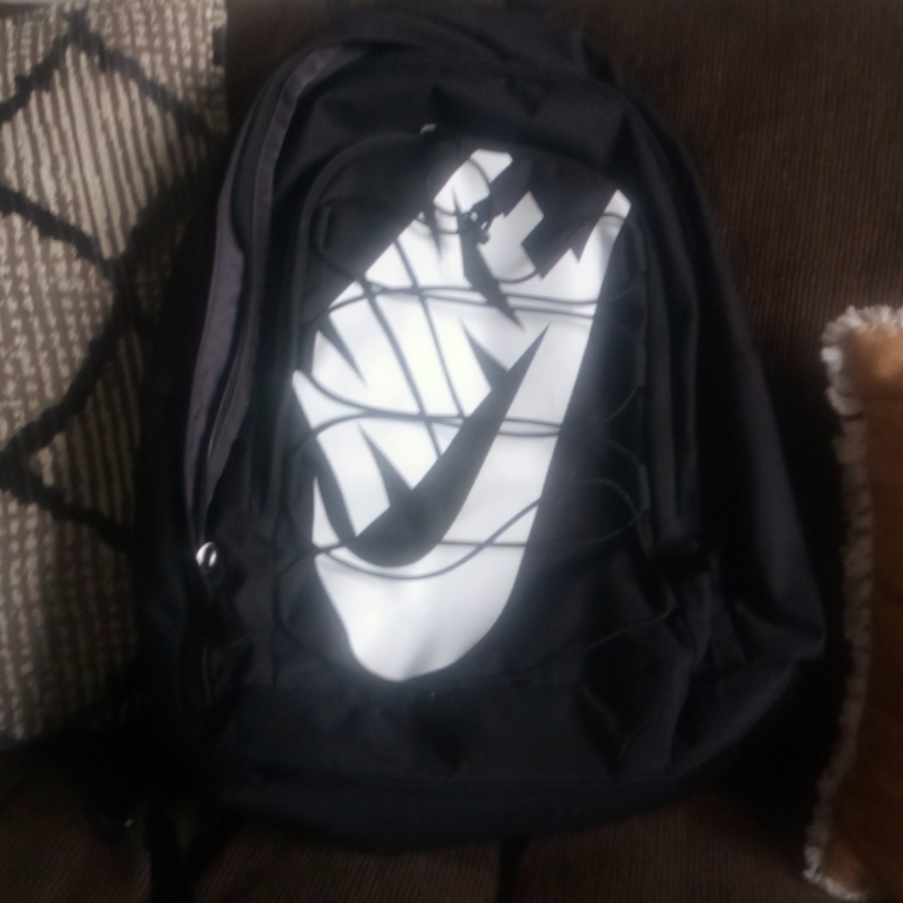 Like new black an white large NIKE backpack